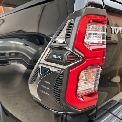 2021+ HILUX BLACK WITH CHROME TAIL LIGHT COVERS